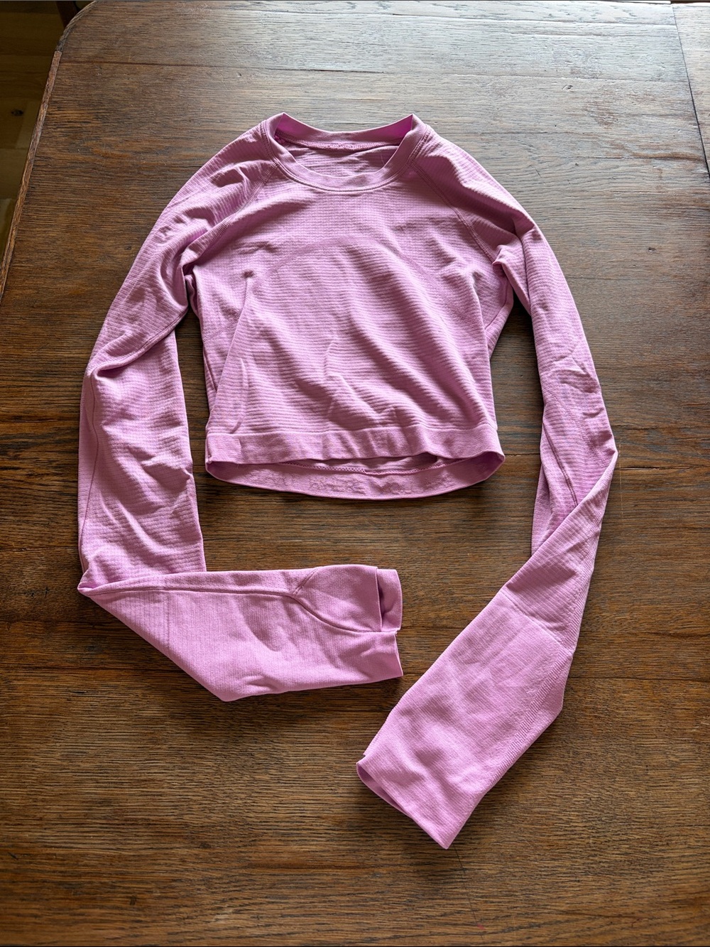 Pink LuLulemon cropped Size 0
Cropped Long-Sleeve Ribbed Top in Dusty Pink